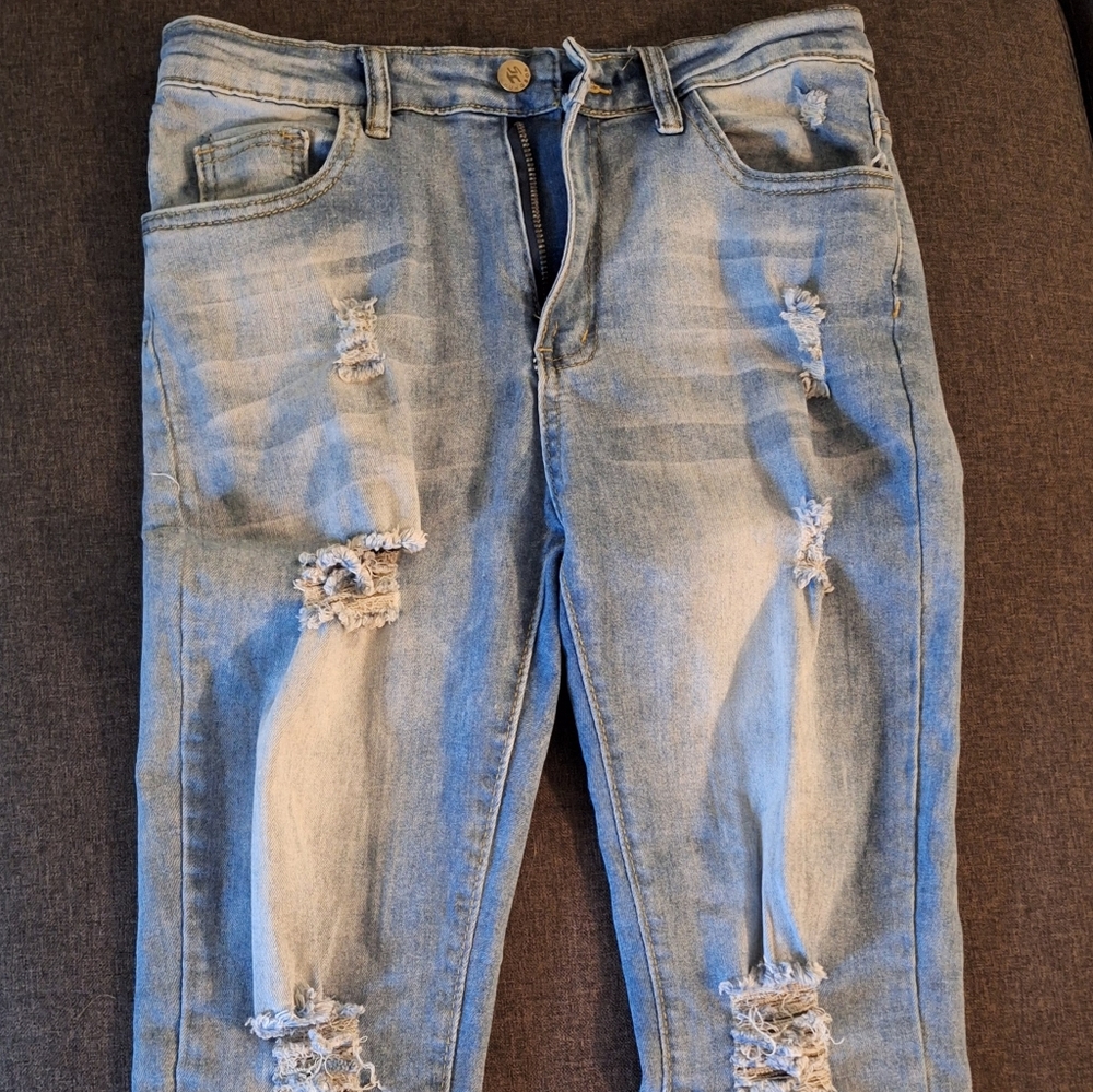 Hungson mens light blue jeans. Distressed slim fit